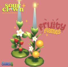 two candles with fruit and flowers on them are next to the words fruity flames