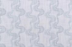 a white and blue wallpaper with an intricate design on it's surface,