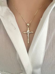 "Explore the enchantment of our 14K Gold INRI Crucifix Pendant - a real gold necklace that's 1.40 inches long and has a unique hollow design. The detailed INRI inscription adds a sacred feel. To enhance its charm, you can choose our optional 14K Gold Dainty 1.0mm Cable Chain, creating a timeless expression of faith. Elevate your fashion with our 1.40-inch 14K Gold INRI Crucifix Pendant - a timeless piece that exudes reverence and sophistication. Suitable for any occasion, this hollow design makes it an ideal accessory. Add extra beauty by opting for the optional dainty cable chain in 14K Gold, achieving a perfect balance of faith and style. Product Specification: ------------------------------- * Metal: 14k Gold (Properly Stamped, 14K) * Genuine Solid 14K * Condition: Brand New * Approxima Gold Crucifix Necklace, Real Gold Necklace, Aesthetic Galaxy, Crucifix Necklace, Cross Chain, Gold Cross Pendant, Hollow Design, Gold Cross, Chain Pendant