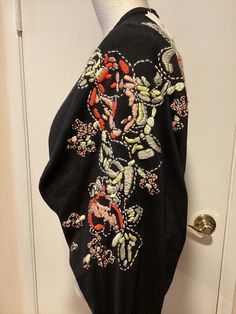 This lovely shrug/cardigan has beautiful embroidery  as shown in the photos. Long raglan type sleeves Open front  55% Silk / 45% Cotton This was purchased several years ago, however,  it is new with tags and has never been worn All my items were purchased from a major department store. All my items come from a pet and smoke free home. Payment is due within 1 day of the auction's end. Thanks! If I have only one shipping option shown, I can always add another one for your convenience (such as USPS Ground Advantage.) Just let me know. Thank you. Shrug Cardigan, Beautiful Embroidery, Embroidered Silk, Department Store, 1 Day, Are You The One, Sweater Outfits, Women Accessories, Let Me