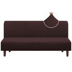 a brown couch sitting on top of a white floor