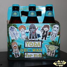 two bottles of yoda obi - wan for me with stickers on them