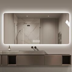 a bathroom with a sink, mirror and lights on the wall above it's counter