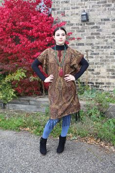 "❥Pashmina Ethnic Print Tunic, hand made using a large scarf/wrap ❥Material is thick and warm for fall/winter ❥open at the sides from hip down for easily slipping on and off ❥Beautiful Indian beaded Print ❥inspired by boho hippie fashion ❥fits size small/medium/large ❥measurements bust fits up to 42\" Hips fit up to 44\" Sleeve is open model is size small medium, this will also fit a large (i am 42\" bust and 44\" hip and this fits me loosely as well :) ❥shipping -All shipping within CANADA and One Size Pashmina Shawl For Fall, Traditional Fringe Poncho For Fall, Bohemian Shawl Poncho For Fall, Fall Festival Poncho Shawl, Traditional Fall Poncho With Fringe, Fall Festival Shawl Poncho, Folk Style Fall Poncho, Traditional Paisley Print Shawl For Fall, Bohemian Pashmina Shawl For Fall