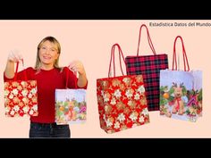 a woman is holding three shopping bags in her hands and the bag has pictures of animals on it