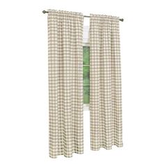 a window curtain with a green and white checkered pattern