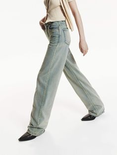 MO&Co. Women's Straight Leg Vintage Jeans Introducing our timeless straight-leg jeans, crafted from 100% premium cotton for ultimate comfort and durability. The relaxed fit provides a laid-back and effortless style, perfect for everyday wear. Featuring a retro-washed light blue finish, these jeans have a vintage look that's both fashionable and nostalgic. Features : - Straight leg, relaxed fit, mid rise, full length- Zip fly, classic five-pocket design Code: MBD3JEN011The back length of size M/2