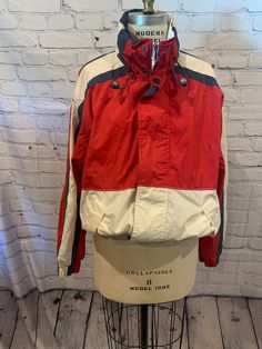 Trader Bay Jacket  Red, White and Blue Listed as a Size SM Chest 46 Waist 32 Not Stretched Stretched 46 Jacket Length Neck to waist - 25 1/2 In good condition Red Vintage Windbreaker For Winter, Retro Red Windbreaker With Pockets, Red Retro Windbreaker With Pockets, Vintage Red Windbreaker For Fall, Retro Red Windbreaker For Fall, 90s Jacket, White Jacket, Blue Vintage, Red Jacket