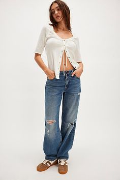 *The* perfect retro-inspired jeans from Levi's. **Fit:** Mid-rise, straight-leg silhouette with slouchy fit **Features:** Zip fly and button closure, five-pocket design, rigid denim fabrication **Why We | Levi's Baggy Dad Jeans at Free People in Medium Wash, Size: 26 Boot Barn, Jeans Free People, Dad Jeans, Bottom Clothes, She Said, Clothes Gift, Levis Jeans, Retro Inspired, Jacket Outfits