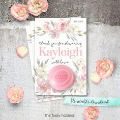 an advertisement for kaylieigh with pink flowers around it