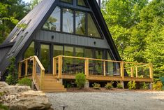 a large house with stairs leading up to it