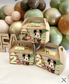 mickey mouse birthday party supplies with balloons and decorations