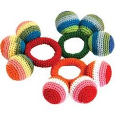 six crocheted rings are shown in different colors and sizes, one is multicolored