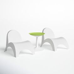 two white chairs and a green table on a white background