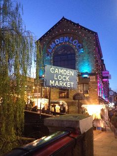 the camden lock market is lit up at night