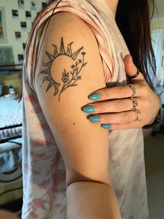 sun & flower tattoo on upper arm. Sun Tattoos With Flowers, Sun And Vine Tattoo, Small To Medium Tattoos, Sun And Flowers Tattoo, Sun Shoulder Tattoos For Women, Flower And Sun Tattoo, Sun With Flowers Tattoo, Floral Sun Tattoo, Shoulder Sun Tattoo