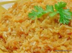 a plate with rice and parsley on top