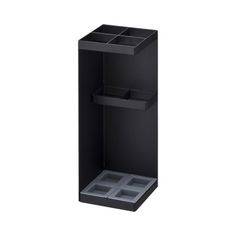 a black cabinet with three compartments on it