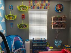 a child's playroom with toys and decor