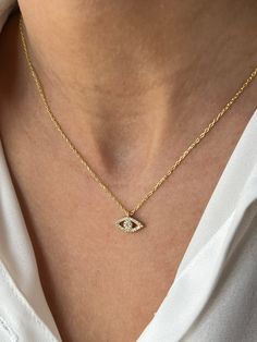 All eyes on you 👁️ Get this cute jewelry made with the high quality elements✨ You can go with 925K Sterling Silver with the options of Gold, Rose Gold or White Gold finish Beautiful jewelry for everyone 💙 ✨ Highlights ✨ * 925K Sterling Silver → 14K Gold, Rose Gold or White Gold plated * Chain length is approximately 18 inches (16+2 in extender) / 45 cm (40+5 cm extender) * Time is important! You will receive your package as soon as possible 🚚 * We care about the quality of metal to make sure Yellow Gold Round Jewelry With Diamond Eyes, Tiny 14k Yellow Gold Necklace, Minimalist Jewelry With Diamond Eyes For Anniversary, Fine Jewelry In 14k Gold Filled With Tiny Details, Minimalist Yellow Gold Jewelry With Diamond Eyes, Dainty Cubic Zirconia Jewelry, Evil Eye Diamond Jewelry Gift, Evil Eye Diamond Jewelry As Gift, Diamond Evil Eye Jewelry Gift