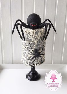 a cake decorated to look like a spider