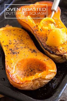 roasted butternut squash in a cast iron skillet with the title overlay reads oven roasted butternut squash