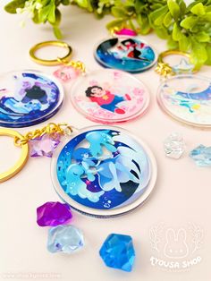 These clear keychains from the show [Steven Universe] come outfitted with a gold keyring and star charms to match the motif of the Crystal Gems. Each keychain design features a background matching a scene from the show! - About 1.75" in diameter - Single-sided - Clear transparent acrylic - Gold keyring Variations available: - Pearl (Pearl's Room) - Garnet (The Answer) - Amethyst (Amethyst's Room) - Lapis (Ocean Gem) - Steven (Rose's Room) Garnet Amethyst And Pearl, Background Matching, Pearl And Steven, Keychains Charms, Simple Face, The Crystal Gems, December 2024, Keychain Design, Star Charms