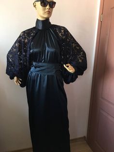 This is a very stylish Womens Satin dress with lace sleeves. It is comfortable and cozy. Made for a free flowing fit. Great for all year around and for any special occasion.Comes with long tie who can use as a neck bow tie or as a belt,tied at front or at back. Slot at back 40 cm. Full length 145 cm and can be customized,just let me know. SIZE CHARTSIZE S - US 6, UK 8, EU 36bust: bust around 34.5”/90cmWaist: waist around 27.5”/70cmHips: hips around 34.5”/90cmSIZE M - US 8, UK 10, EU 38bust: bust Satin Dress Plus Size, Satin Dress Bridesmaid, Satin Dress With Lace, Satin Lace Dress, Satin Bow Blouse, Dress Bow Tie, Long Satin Dress, Neck Bow Tie, Plus Size Prom Dress