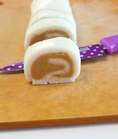 a piece of food sitting on top of a cutting board