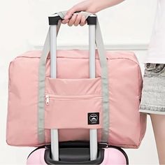 The Nwt Pink Foldable Travel Duffle Bag Is A Stylish And Functional Accessory Designed For Travel Enthusiasts. With Its Large Capacity, It Offers Ample Space To Pack All Your Essentials For A Weekend Getaway Or Longer Trips. The Bag Features A Foldable Design, Allowing For Easy Storage When Not In Use. The Bag Comes With A Convenient Feature Which Allows You To Slide It Onto Your Suitcase Handle For Effortless Lugging! Its Vibrant Pink Color Adds A Touch Of Elegance To Your Travel Ensemble. Addi Mode Rose, Waterproof Tote, Travel Storage Bag, Accessories Packing, Travel Workout, Hand Luggage, Travel Duffel, Duffel Bag Travel, Travel Storage