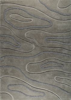 a gray rug with wavy lines on it