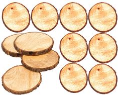 several pieces of wood are shown with the slices cut out to be used as coasters