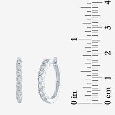 Features: Quick ShipDiamond Clarity: I1-I2Earring Back: HingedSetting: NickStone Cut: RoundDiamond Color: G-HMetal Color: WhiteEarring Length: 20mmEarring Width: 3mmRounded Carat Weight: 1/4 Ct. T.w.Care: Wipe CleanStone Type: 14 Lab Grown DiamondAuthenticity: Lab Grown DiamondBirthstone: April BirthstoneEarrings Style: Hoop EarringsMetal: Sterling SilverCountry of Origin: Imported White Diamond Small Hoop Earrings, Small White Diamond Hoop Earrings, White Sterling Silver Hoop Earrings With Diamond Accents, Hypoallergenic Small Hoop Diamond Earrings In White Gold, White Huggie Earrings With Halo Design, White Halo Huggie Earrings, White Diamond Halo Hoop Earrings, White Diamond Hoop Earrings For Pierced Ears, White Small Hoop Earrings With Halo Design