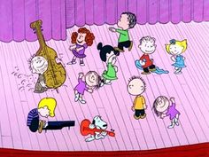 charlie and friends dancing on the stage in front of a group of people with musical instruments