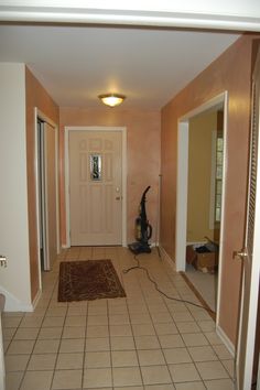 the hallway is clean and ready to be used as a living room or office space