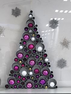 a christmas tree made out of metal tubes