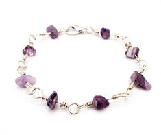 Sterling Silver Amethyst Bracelet Amethyst jewelry has an undeniably calming energy, and this bracelet is no exception! Enjoy the calming vibes with this handmade Amethyst sterling silver bracelet, made with .925 sterling silver and amethyst chip beads! 💜 Your Amethyst sterling silver bracelet will be made to order just for you, so there will be variations in the amethyst crystals from the stock photos. Standard size is 8 inches, but if you need a different size please leave a note at checkout. Purple Bohemian Bracelet For Everyday, Purple Bohemian Bracelet For Everyday Wear, Purple Bohemian Everyday Jewelry, Purple Bracelets With Natural Stones, Everyday Purple Bracelets With Natural Stones, Handmade Purple Sterling Silver Beaded Bracelets, Bohemian Purple Nickel-free Bracelet, Sterling Silver Bracelets With Natural Stones For Healing, Bohemian Nickel Free Purple Bracelets