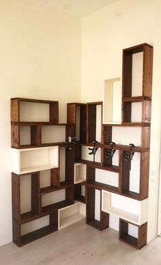 an empty room with shelves and cabinets in it