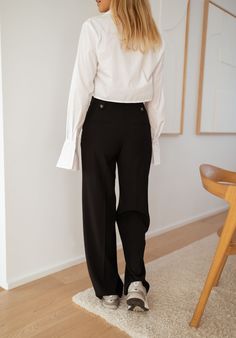 Long pants Sizing runs true to size Patches on the waist Our models wear the White Orlando Shirt, Black Anais Blouse, Ecru Anais Blouse and Grey Tulsa Sweater Not lined Two pockets on the front Zipper and button Sizes: S / M / L S: Length 42.91 in - Width 13.78 inM: Length 43.31 in - Width 14.57 in L: Length 43.70 in - Width 15.35 in Contexture: 97% polyester - 3% spandex Washing: handwash recommended Black Button-up Pants For Work, Black Button-up Work Pants, Casual Office Pants With Buttons, Casual Office Dress Pants With Buttons, Chic Workwear Pants With Button Cuffs, Chic Workwear Bottoms With Button Cuffs, Chic Pants With Button Cuffs For Work, Chic Button Cuffs Pants For Workwear, Chic Bottoms With Button Cuffs For Work