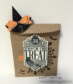 a trick or treat bag with a bow on top