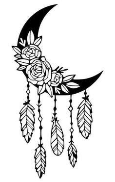 a black and white drawing of a crescent with flowers hanging from it's side