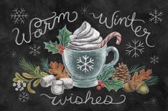 a chalkboard sign that says warm winter wishes with a cup of whipped cream and candy cane