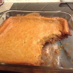 a cake in a pan on top of a stove