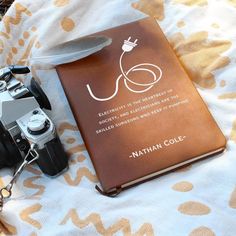 a book with a camera on top of it