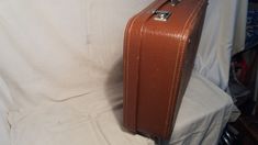 Vintage 1960's red/brown leather suitcase - medium size. Measurements; H - 17'' [ 43cm.] W - 24 4/5'' [ 63cm.] Side - 7'' [ 17.5cm.] Two pockets inside. Leather handle. Missing key. Used.Very good vintage condition. NOTE: All vintage items in my shop that are used have been restored according to the possibilities All defects are removed,except the normal signs of use over the years. Thank you and successful shopping. Retro Brown Briefcase For Formal Use, Retro Brown Briefcase, Vintage Brown Travel Bag With Leather Trim, Vintage Brown Leather Bag With Luggage Sleeve, Vintage Brown Rectangular Briefcase With Luggage Sleeve, Vintage Brown Cases With Luggage Sleeve, Vintage Brown Leather-handled Travel Bag, Leather Suitcase, Suitcases