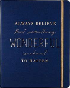 a blue book with gold lettering on the front and back cover that says, always believe that something wonderful is about to happen