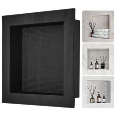 a black frame with bottles and candles on it in front of white wallpapers