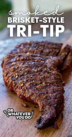 some kind of meat sitting on top of a cutting board with the words smoked brisket - style tri - tip