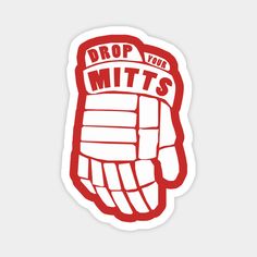 a red and white sticker with the words drop your mitts in front of it