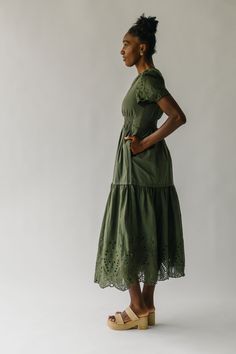 Introducing the game-changing Abello Eyelet Detail Maxi Dress in Olive! With eye-catching eyelet details, this dress will make you stand out in any crowd. Let your personality shine through as you rock this quirky yet stylish dress. Don't miss out on this must-have addition to your wardrobe! Details self/lining: 60% cotton + 40% polyester Fabric Care Guide Here Sizing & Fit Measurements are approximate and taken while laying flat across the front. Not doubled. small: bust = 17"; waist = 13"; len Game Change, Nursing Friendly, Puff Sleeve Blouse, You Rock, Jeans Jumpsuit, Floral Midi Dress, Cardigan Jacket, Small Bust, Top Dress